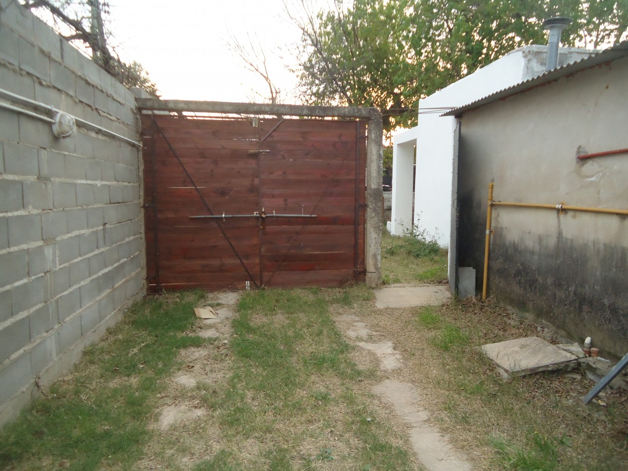 San Roque, Sobre calle principal del barrio.- 